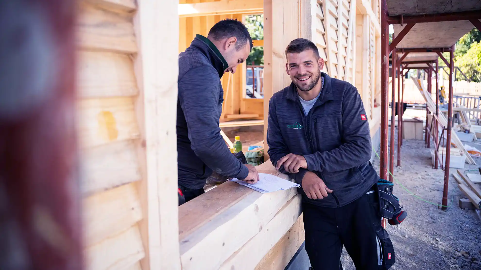 Two people on construction site